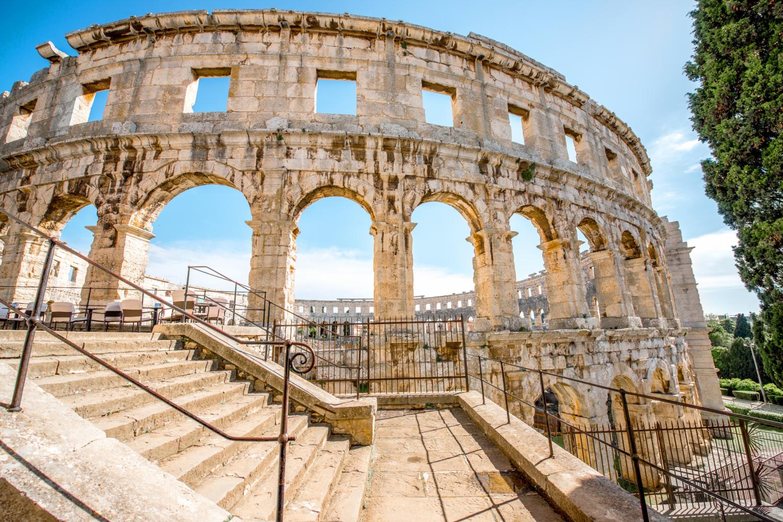 Architectural fragment of ancient roman amphitheatre in Pula city in Croatia.